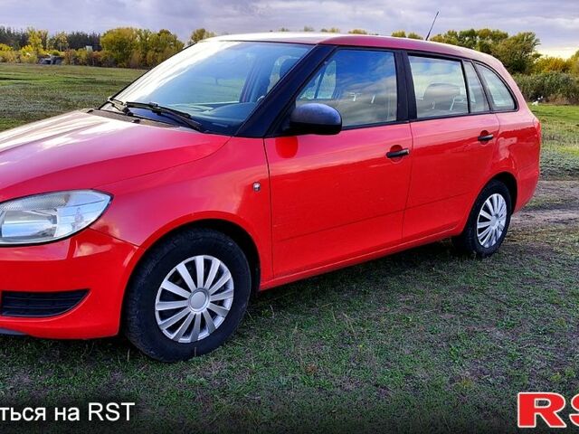 Шкода Фабия 2010 в Каменское - Днепродзержинск на Automoto.ua Красный Шкода Фабия, объемом двигателя 1.4 л и пробегом 235 тыс. км за 4100 $, фото 2 на Automoto.ua