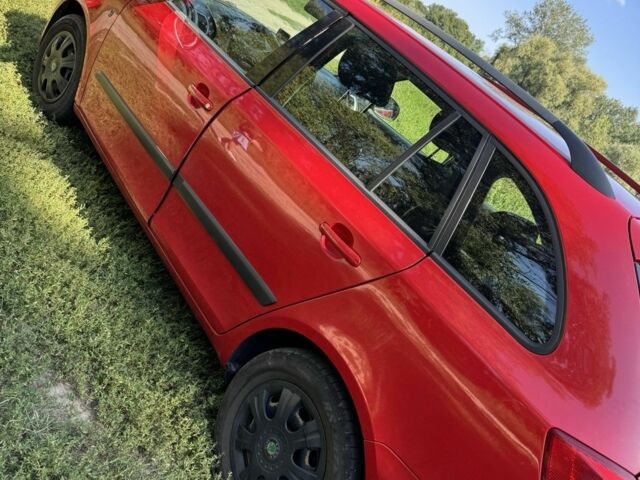 Красный Шкода Фабия, объемом двигателя 1.4 л и пробегом 324 тыс. км за 5200 $, фото 5 на Automoto.ua