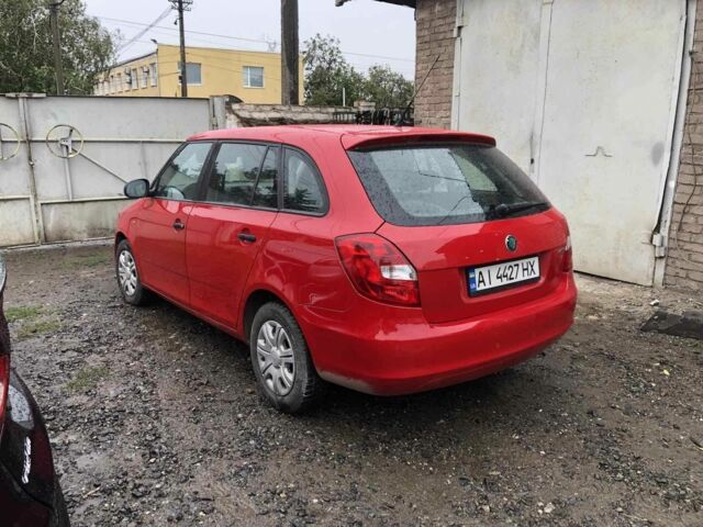 Красный Шкода Фабия, объемом двигателя 1.6 л и пробегом 217 тыс. км за 5200 $, фото 1 на Automoto.ua