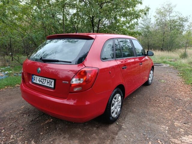 Красный Шкода Фабия, объемом двигателя 1.6 л и пробегом 217 тыс. км за 5200 $, фото 6 на Automoto.ua