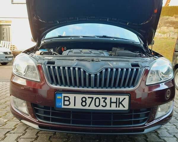 Шкода Фабия 2011 в Житомире на Automoto.ua Красный Шкода Фабия, объемом двигателя 1.2 л и пробегом 176 тыс. км за 6000 $, фото 20 на Automoto.ua