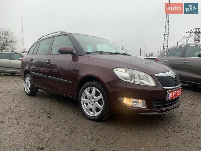 Красный Шкода Фабия, объемом двигателя 1.2 л и пробегом 222 тыс. км за 7800 $, фото 6 на Automoto.ua