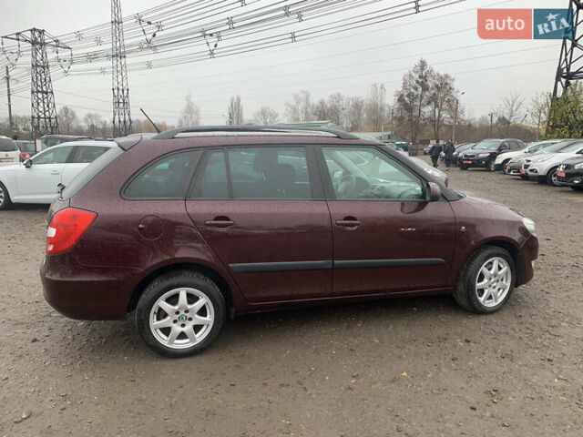 Красный Шкода Фабия, объемом двигателя 1.2 л и пробегом 222 тыс. км за 7800 $, фото 5 на Automoto.ua