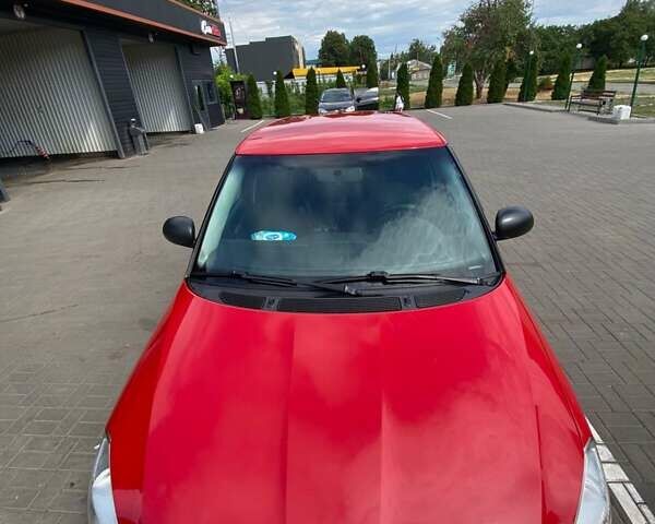 Шкода Фабия 2012 в Лозовой на Automoto.ua Красный Шкода Фабия, объемом двигателя 1.2 л и пробегом 256 тыс. км за 5600 $, фото 5 на Automoto.ua