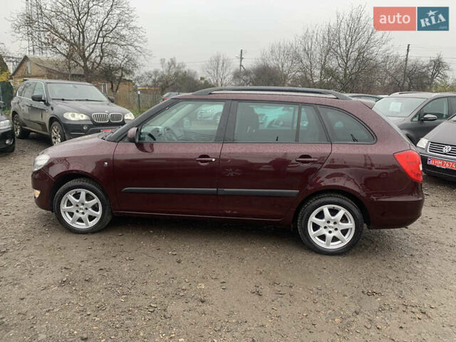 Красный Шкода Фабия, объемом двигателя 1.2 л и пробегом 222 тыс. км за 7800 $, фото 11 на Automoto.ua