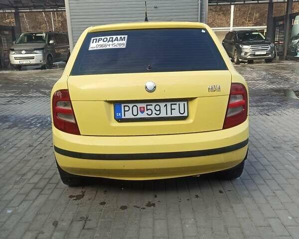 Желтый Шкода Фабия, объемом двигателя 1.4 л и пробегом 253 тыс. км за 1300 $, фото 5 на Automoto.ua