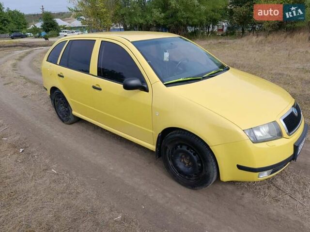 Желтый Шкода Фабия, объемом двигателя 1.4 л и пробегом 209 тыс. км за 4200 $, фото 7 на Automoto.ua