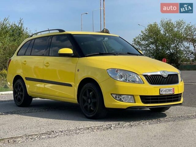 Желтый Шкода Фабия, объемом двигателя 1.2 л и пробегом 169 тыс. км за 8350 $, фото 1 на Automoto.ua