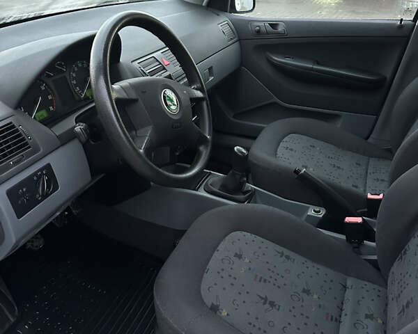 Серый Шкода Фабия, объемом двигателя 1.4 л и пробегом 158 тыс. км за 2999 $, фото 8 на Automoto.ua