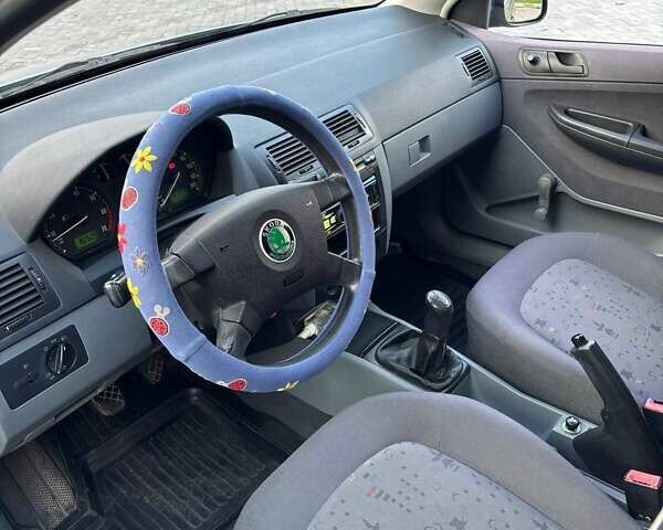 Серый Шкода Фабия, объемом двигателя 1.4 л и пробегом 291 тыс. км за 3500 $, фото 9 на Automoto.ua