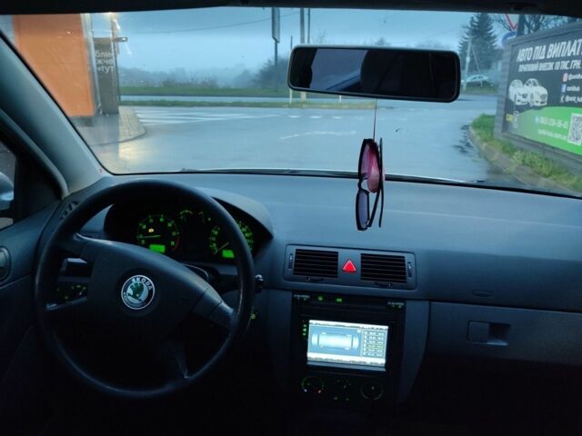 Серый Шкода Фабия, объемом двигателя 1.4 л и пробегом 262 тыс. км за 3500 $, фото 4 на Automoto.ua