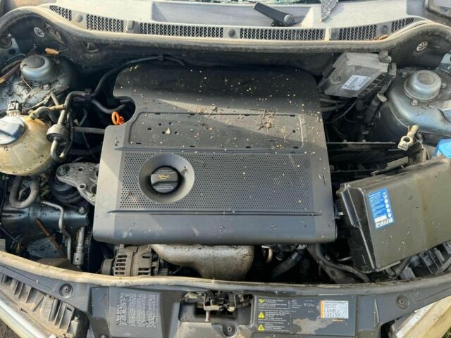 Серый Шкода Фабия, объемом двигателя 1.4 л и пробегом 160 тыс. км за 650 $, фото 4 на Automoto.ua