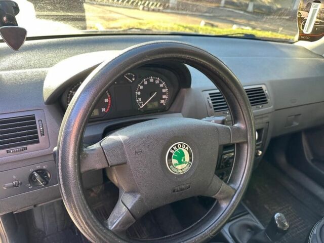 Серый Шкода Фабия, объемом двигателя 1.2 л и пробегом 196 тыс. км за 3400 $, фото 3 на Automoto.ua