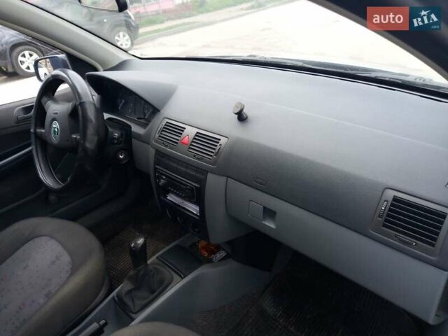 Серый Шкода Фабия, объемом двигателя 1.2 л и пробегом 188 тыс. км за 4200 $, фото 6 на Automoto.ua
