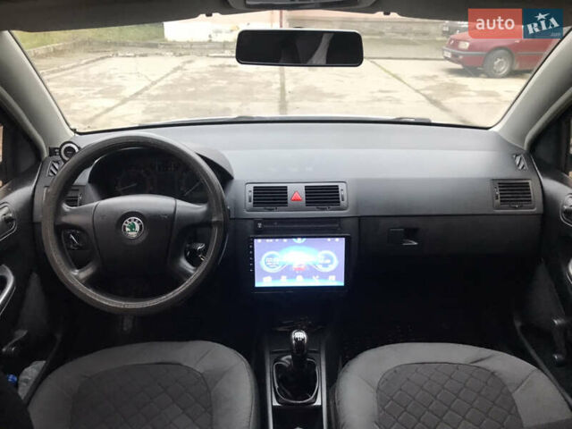 Серый Шкода Фабия, объемом двигателя 1.2 л и пробегом 259 тыс. км за 3400 $, фото 5 на Automoto.ua