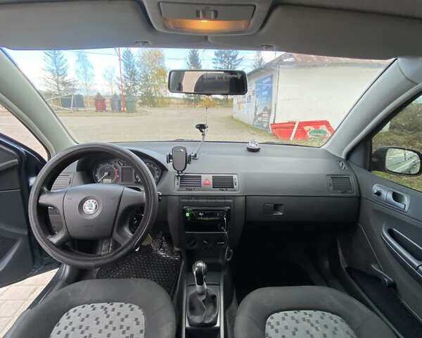 Серый Шкода Фабия, объемом двигателя 1.2 л и пробегом 207 тыс. км за 4000 $, фото 9 на Automoto.ua