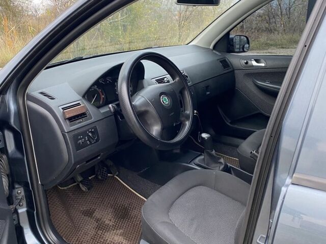 Серый Шкода Фабия, объемом двигателя 1.4 л и пробегом 293 тыс. км за 4200 $, фото 15 на Automoto.ua