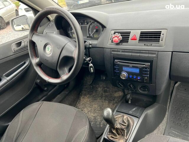 Серый Шкода Фабия, объемом двигателя 1.2 л и пробегом 243 тыс. км за 3390 $, фото 32 на Automoto.ua