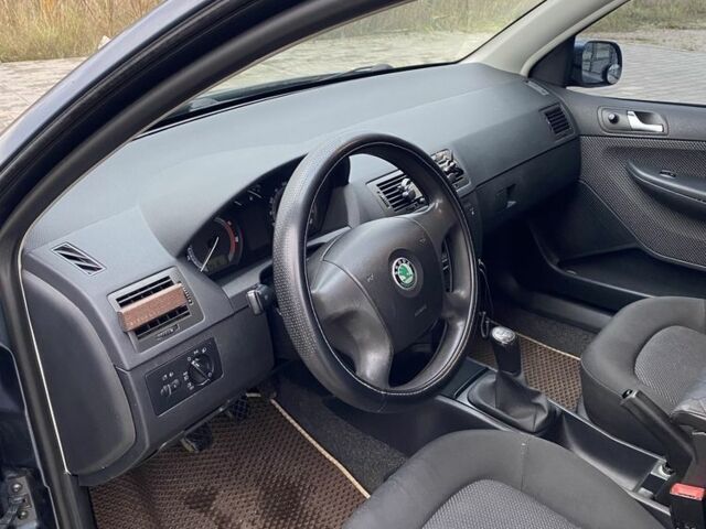 Серый Шкода Фабия, объемом двигателя 1.4 л и пробегом 293 тыс. км за 4200 $, фото 12 на Automoto.ua