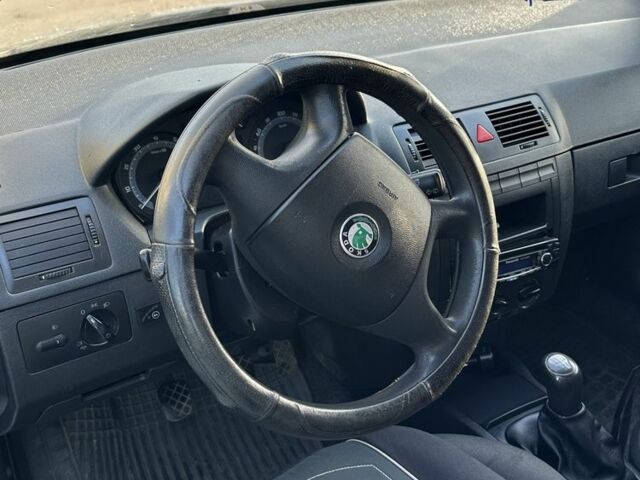 Серый Шкода Фабия, объемом двигателя 1.2 л и пробегом 244 тыс. км за 3200 $, фото 9 на Automoto.ua