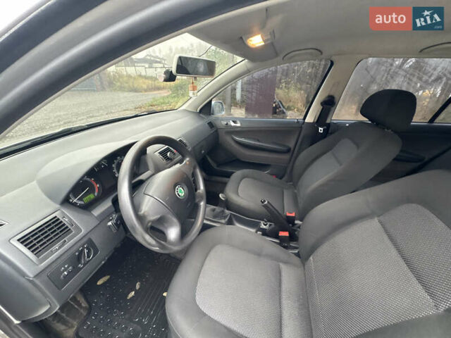 Серый Шкода Фабия, объемом двигателя 1.4 л и пробегом 147 тыс. км за 5600 $, фото 19 на Automoto.ua