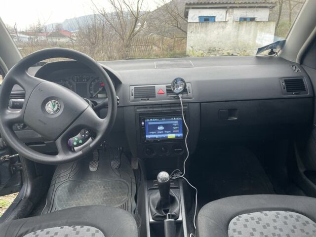 Серый Шкода Фабия, объемом двигателя 1.2 л и пробегом 145 тыс. км за 3900 $, фото 5 на Automoto.ua