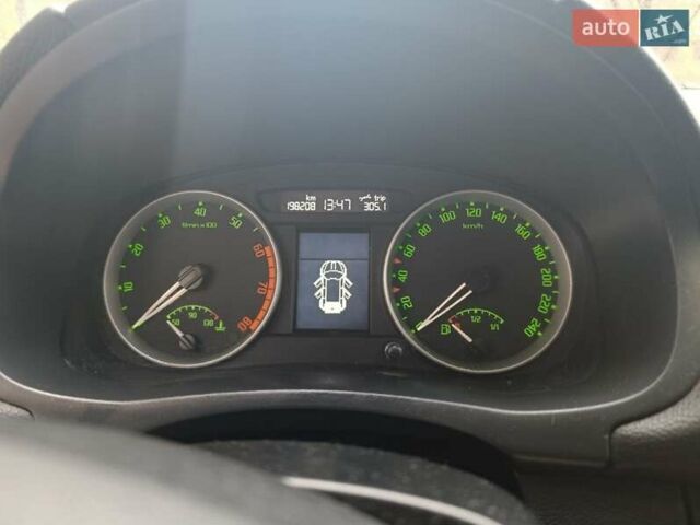 Серый Шкода Фабия, объемом двигателя 1.6 л и пробегом 198 тыс. км за 5900 $, фото 7 на Automoto.ua