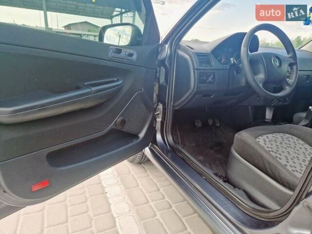 Серый Шкода Фабия, объемом двигателя 1.2 л и пробегом 158 тыс. км за 4100 $, фото 10 на Automoto.ua