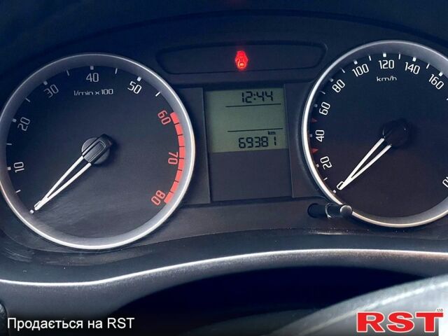 Серый Шкода Фабия, объемом двигателя 1.4 л и пробегом 69 тыс. км за 6150 $, фото 6 на Automoto.ua