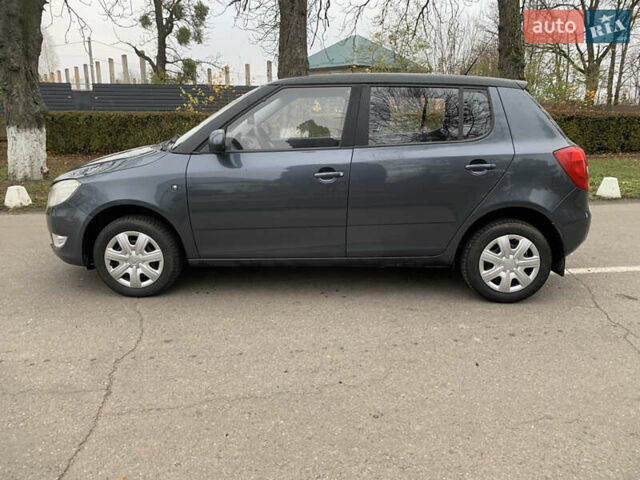Серый Шкода Фабия, объемом двигателя 1.4 л и пробегом 170 тыс. км за 5699 $, фото 1 на Automoto.ua