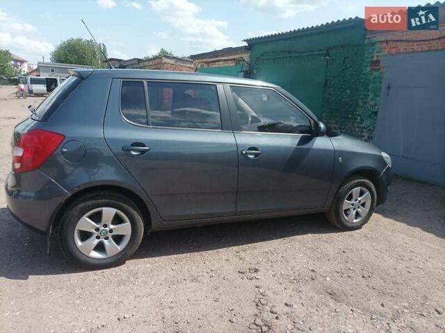 Серый Шкода Фабия, объемом двигателя 1.39 л и пробегом 144 тыс. км за 5300 $, фото 5 на Automoto.ua