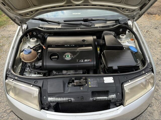 Серый Шкода Фабия, объемом двигателя 1.4 л и пробегом 215 тыс. км за 3300 $, фото 7 на Automoto.ua