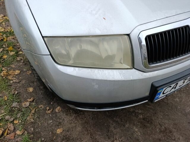 Серый Шкода Фабия, объемом двигателя 1.4 л и пробегом 288 тыс. км за 1888 $, фото 3 на Automoto.ua