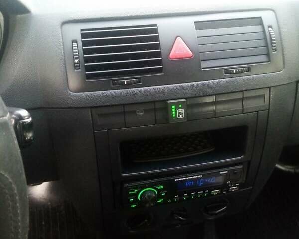 Серый Шкода Фабия, объемом двигателя 1.39 л и пробегом 226 тыс. км за 3550 $, фото 2 на Automoto.ua