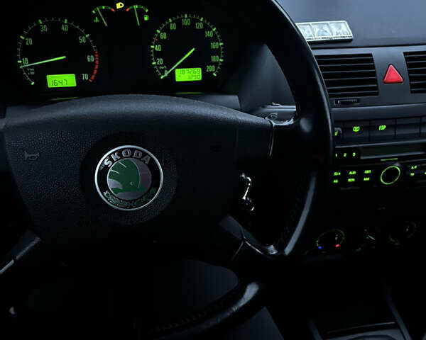 Серый Шкода Фабия, объемом двигателя 1.39 л и пробегом 187 тыс. км за 3500 $, фото 6 на Automoto.ua