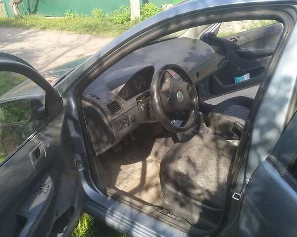 Серый Шкода Фабия, объемом двигателя 1.2 л и пробегом 178 тыс. км за 3300 $, фото 1 на Automoto.ua