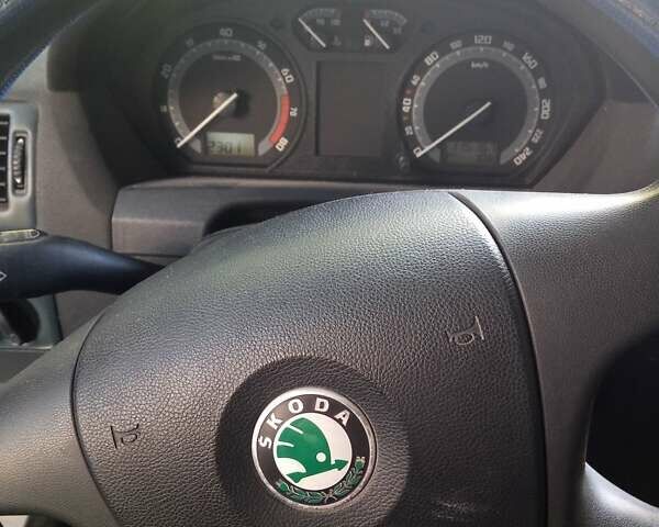 Серый Шкода Фабия, объемом двигателя 1.4 л и пробегом 115 тыс. км за 3300 $, фото 5 на Automoto.ua