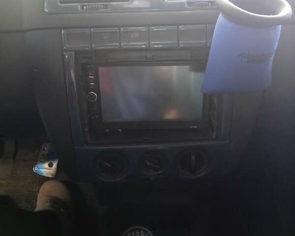 Серый Шкода Фабия, объемом двигателя 1.4 л и пробегом 115 тыс. км за 3300 $, фото 1 на Automoto.ua