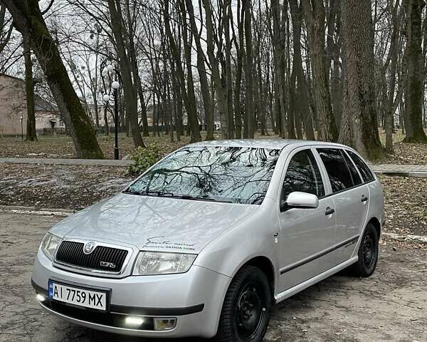 Серый Шкода Фабия, объемом двигателя 1.39 л и пробегом 180 тыс. км за 4700 $, фото 12 на Automoto.ua