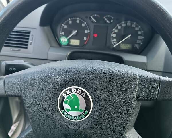 Серый Шкода Фабия, объемом двигателя 1.39 л и пробегом 240 тыс. км за 4200 $, фото 6 на Automoto.ua