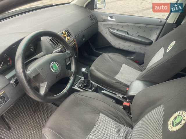 Серый Шкода Фабия, объемом двигателя 1.4 л и пробегом 247 тыс. км за 3900 $, фото 4 на Automoto.ua