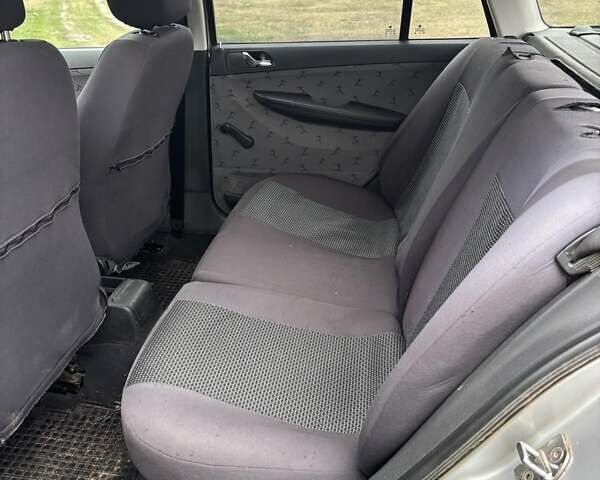 Серый Шкода Фабия, объемом двигателя 1.39 л и пробегом 257 тыс. км за 3750 $, фото 9 на Automoto.ua