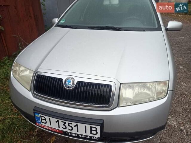 Серый Шкода Фабия, объемом двигателя 1.4 л и пробегом 220 тыс. км за 4200 $, фото 1 на Automoto.ua