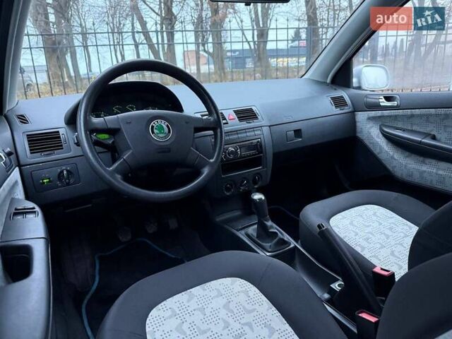 Серый Шкода Фабия, объемом двигателя 1.39 л и пробегом 239 тыс. км за 3500 $, фото 21 на Automoto.ua