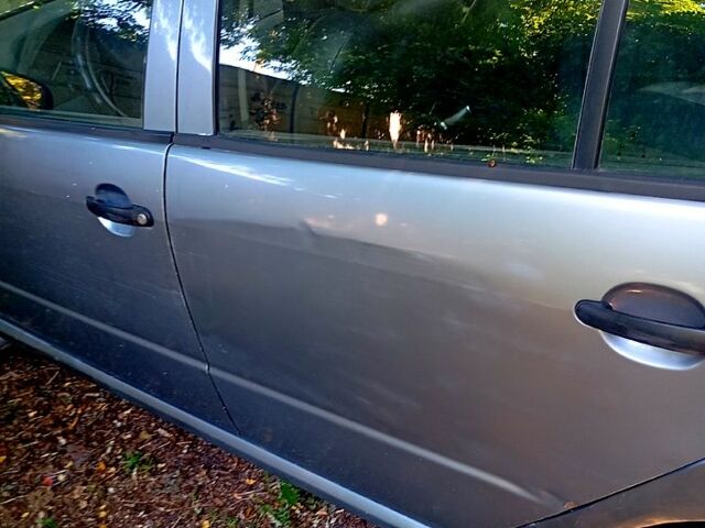 Серый Шкода Фабия, объемом двигателя 1.2 л и пробегом 460 тыс. км за 3700 $, фото 2 на Automoto.ua