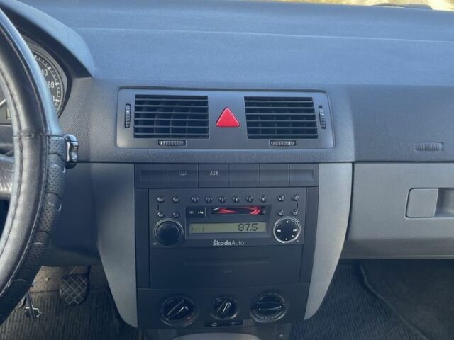 Серый Шкода Фабия, объемом двигателя 1.4 л и пробегом 291 тыс. км за 3050 $, фото 8 на Automoto.ua