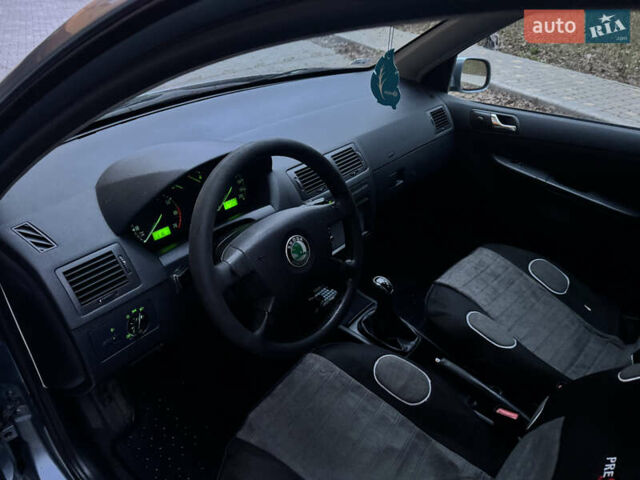 Серый Шкода Фабия, объемом двигателя 1.39 л и пробегом 211 тыс. км за 3799 $, фото 8 на Automoto.ua