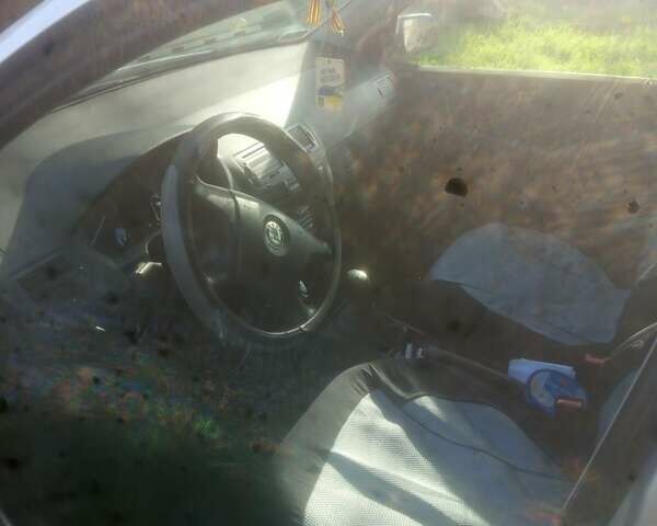 Серый Шкода Фабия, объемом двигателя 1.2 л и пробегом 415 тыс. км за 2300 $, фото 5 на Automoto.ua