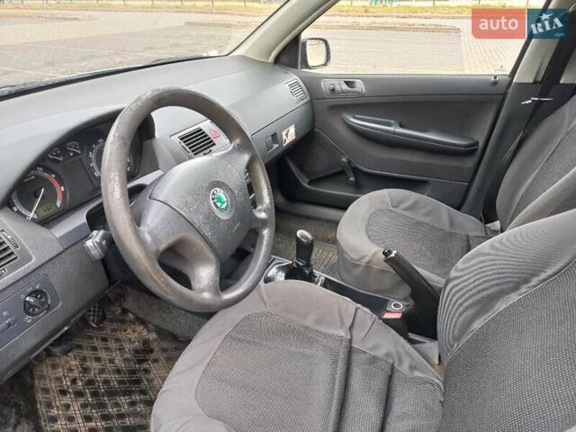 Серый Шкода Фабия, объемом двигателя 1.2 л и пробегом 220 тыс. км за 3500 $, фото 7 на Automoto.ua