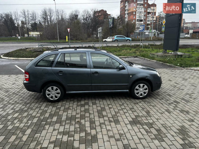 Серый Шкода Фабия, объемом двигателя 1.4 л и пробегом 322 тыс. км за 3700 $, фото 11 на Automoto.ua